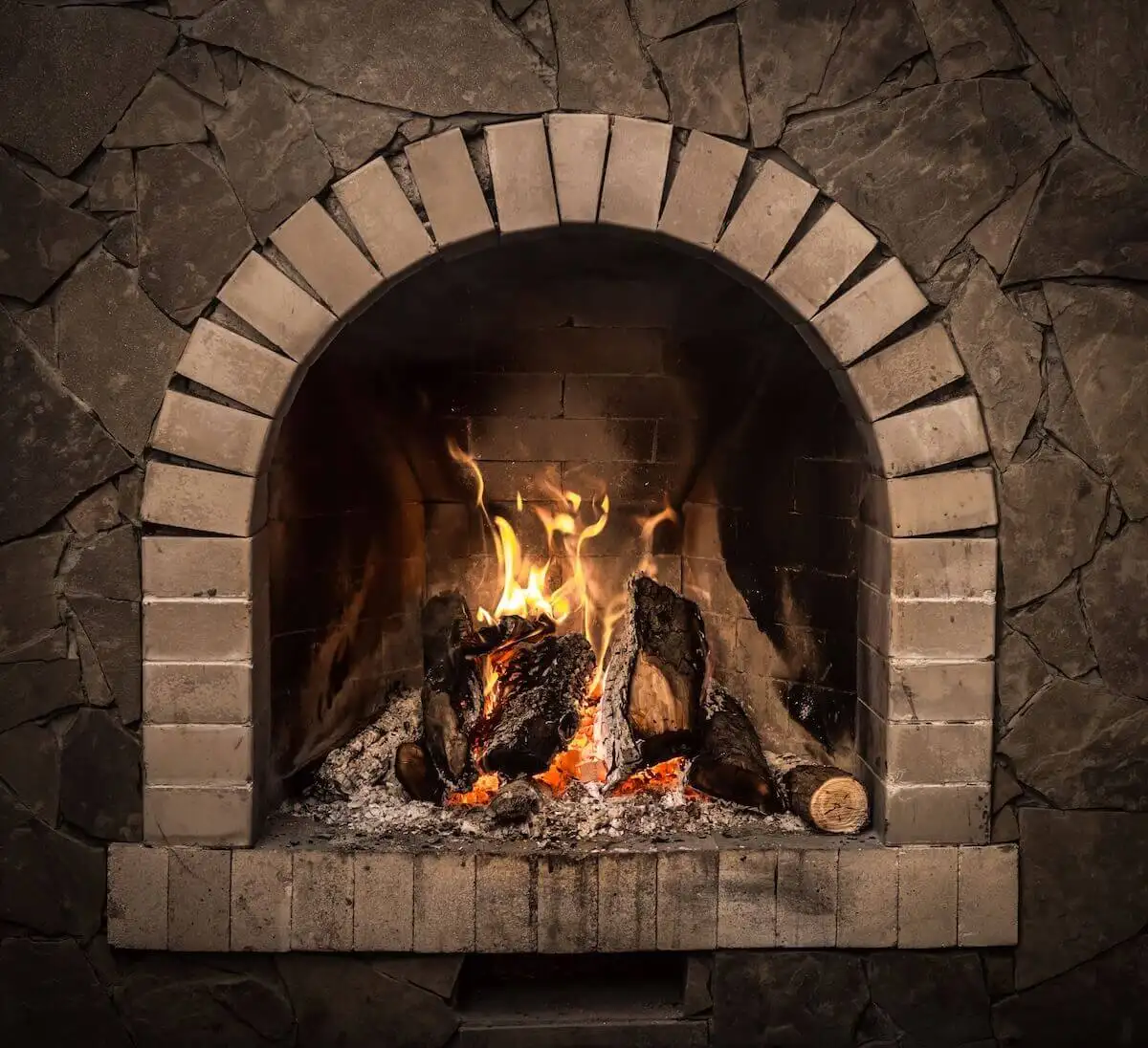 fireplace-with-fire-and-brick